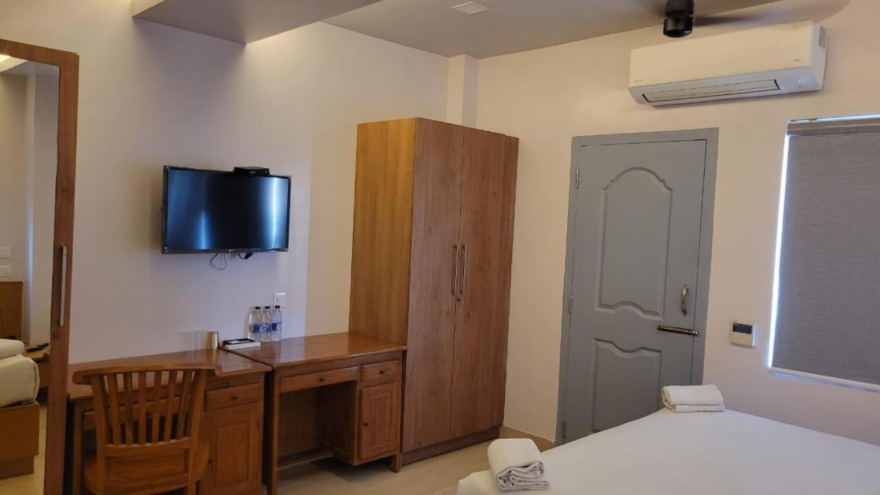 Moshis Nest Hotel Madurai Bagian luar foto